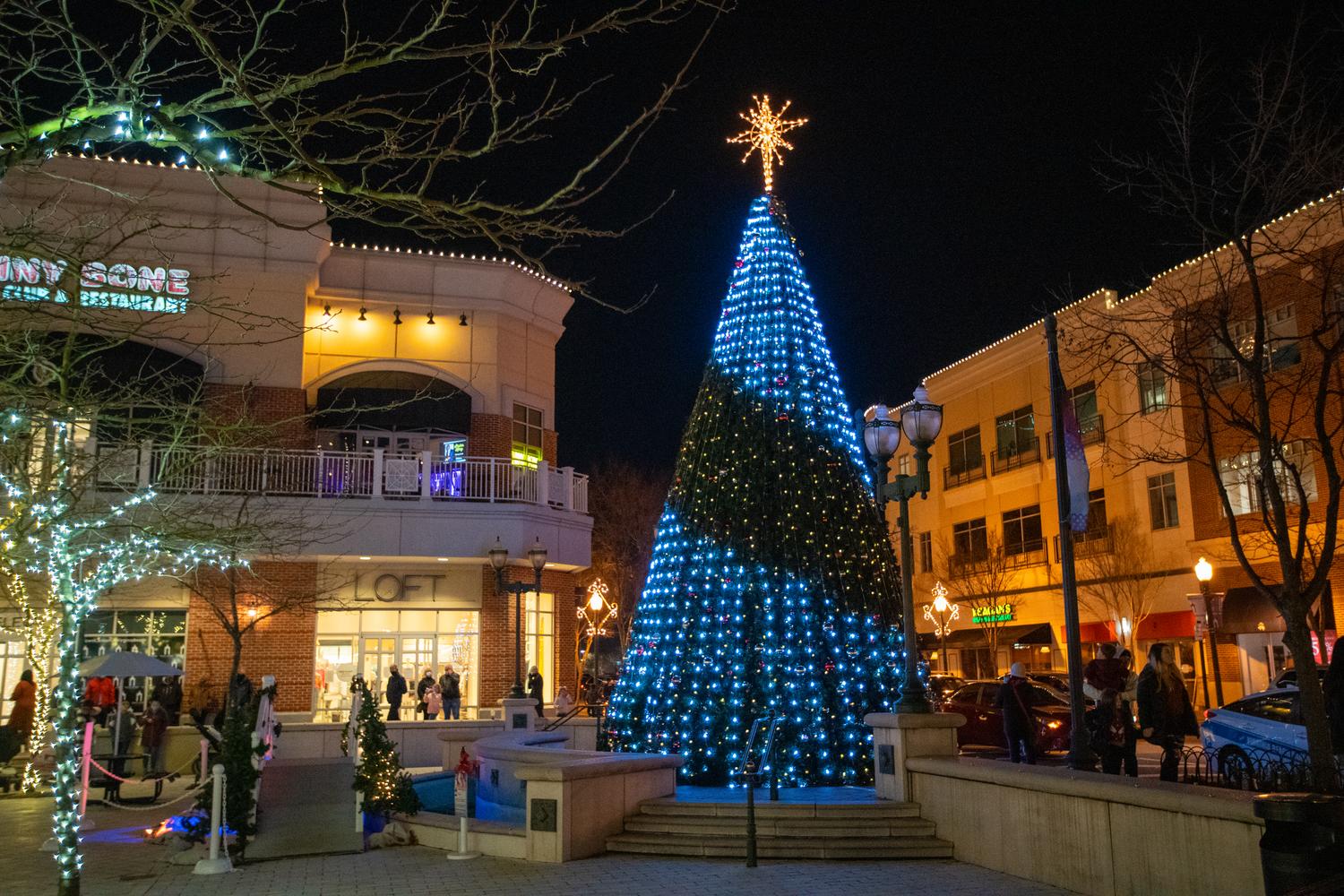 giant lit tree in outdoor shopping plaza