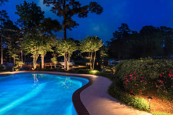 Stunning pool and landscape lighting by Outdoor Lighting Perspectives