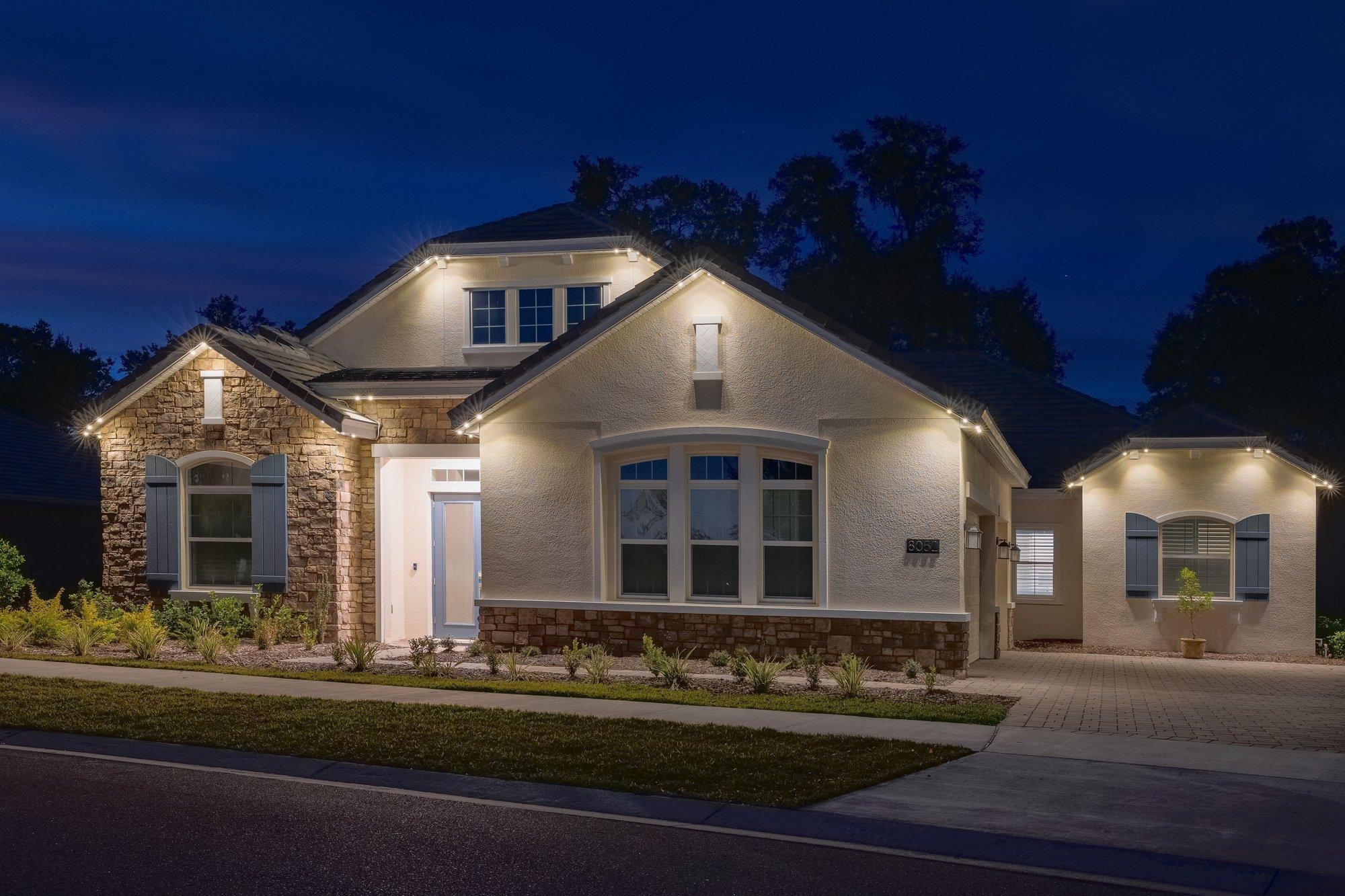 Craftsman home with elegant warm white permanent roofline lighting for everyday curb appeal