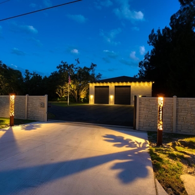 Create a stunning first impression with attraction lights at your gate or entryway. Photo