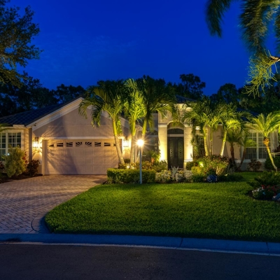 Beautiful curb appeal and landscape lighting for this home in Lakewood Ranch FL. Photo