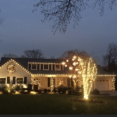 House with white lights Photo