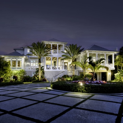 Curb appeal and driveway lighting on this home in Pinecrest.   Photo