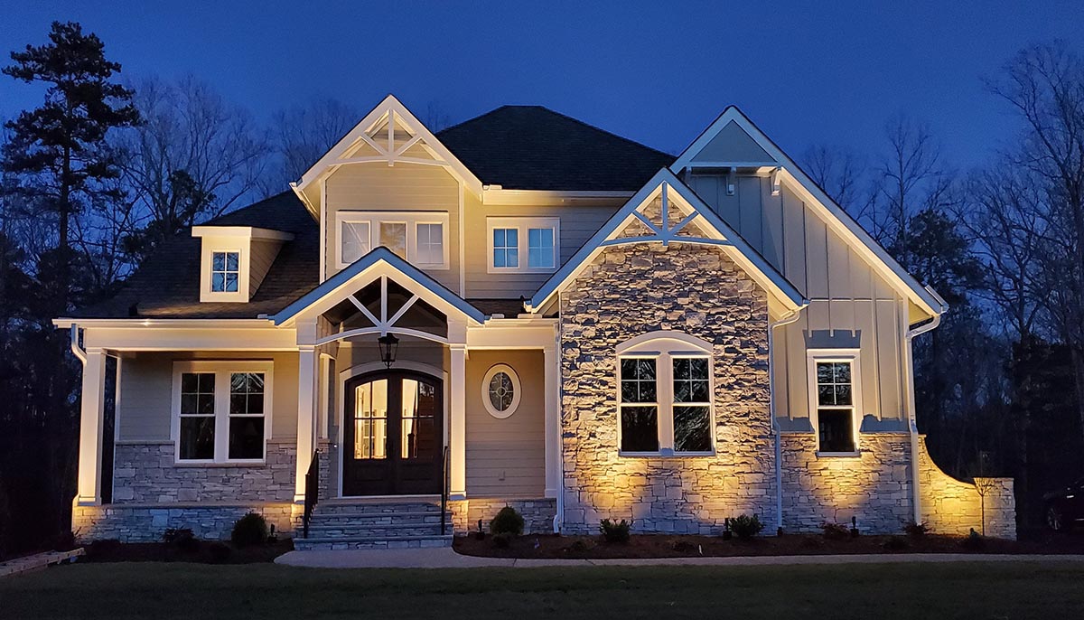 Home with outdoor lighting 