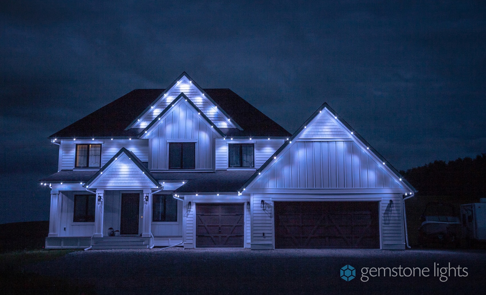 house lit up in blue lighting