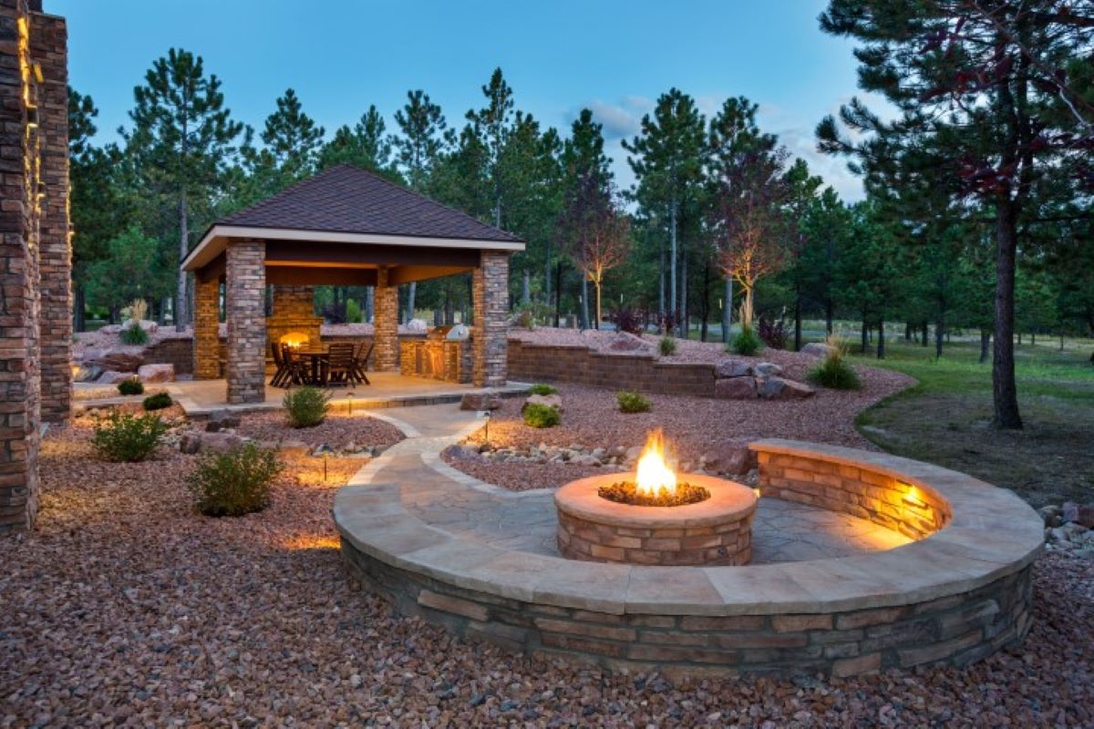 Fire pit with outdoor lighting in Rochester