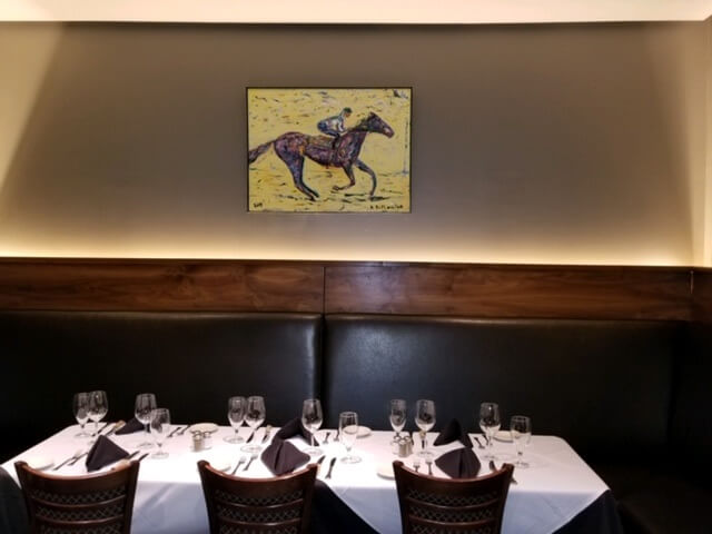 Horse painting and restaurant lighting