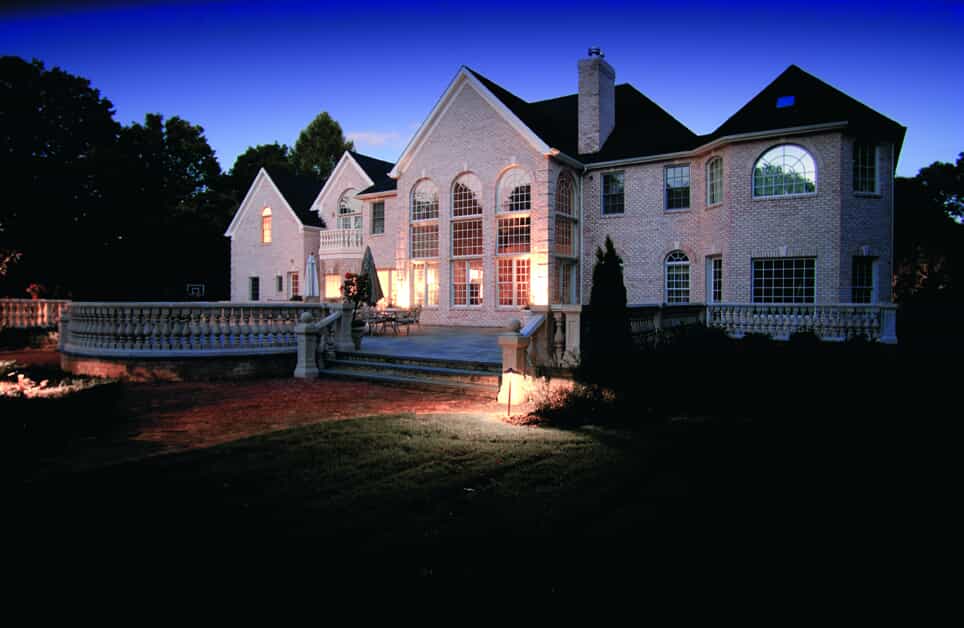 home with exterior landscape lighting