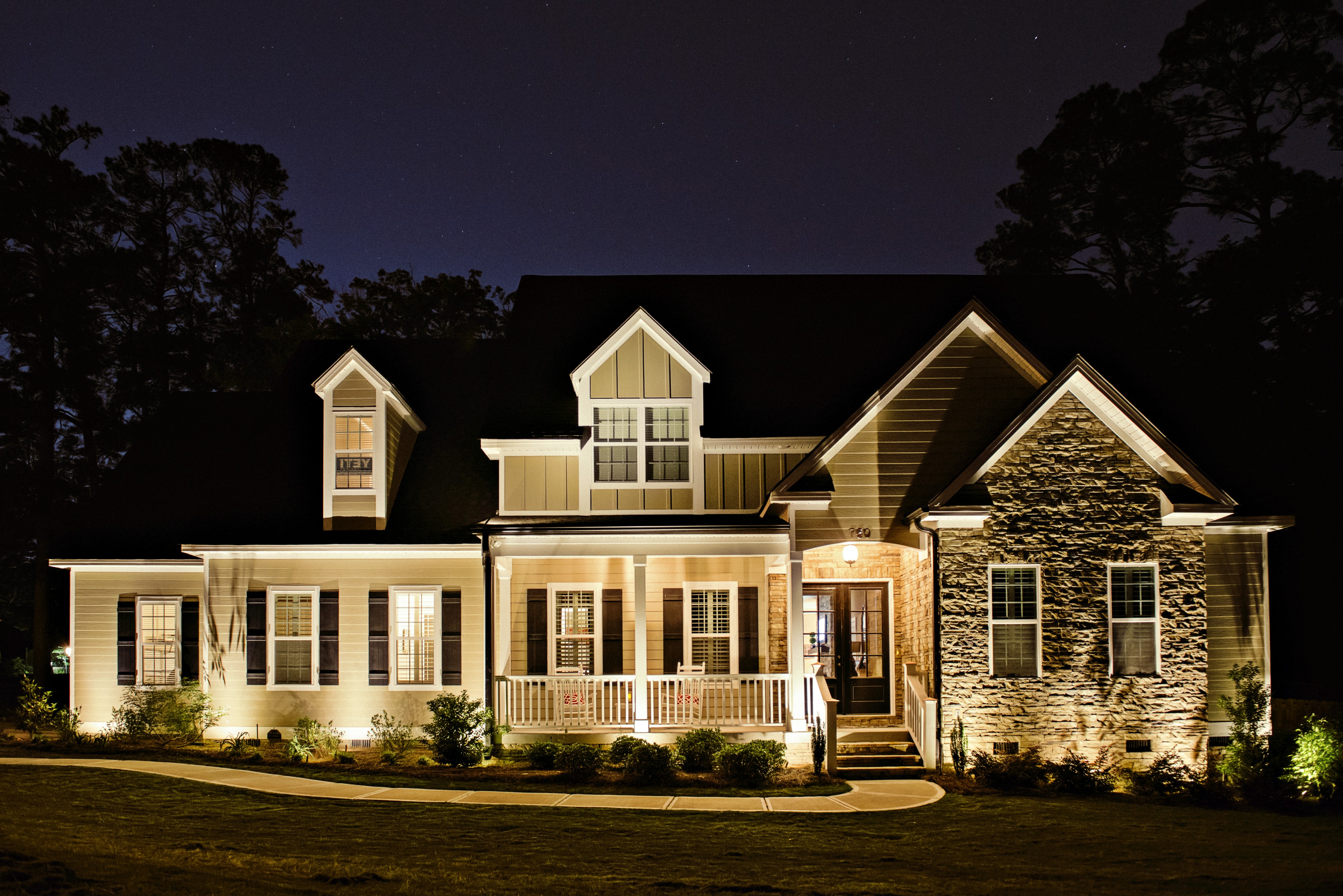 House with outdoor lighting design