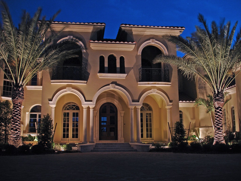 Home with outdoor landscape lighting service