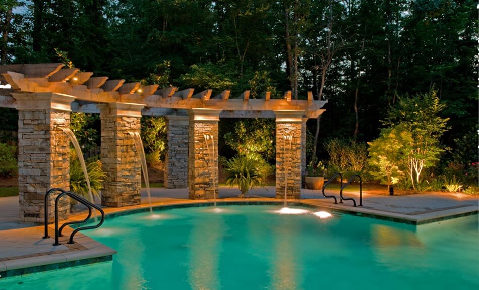 Charleston backyard with pool lighting