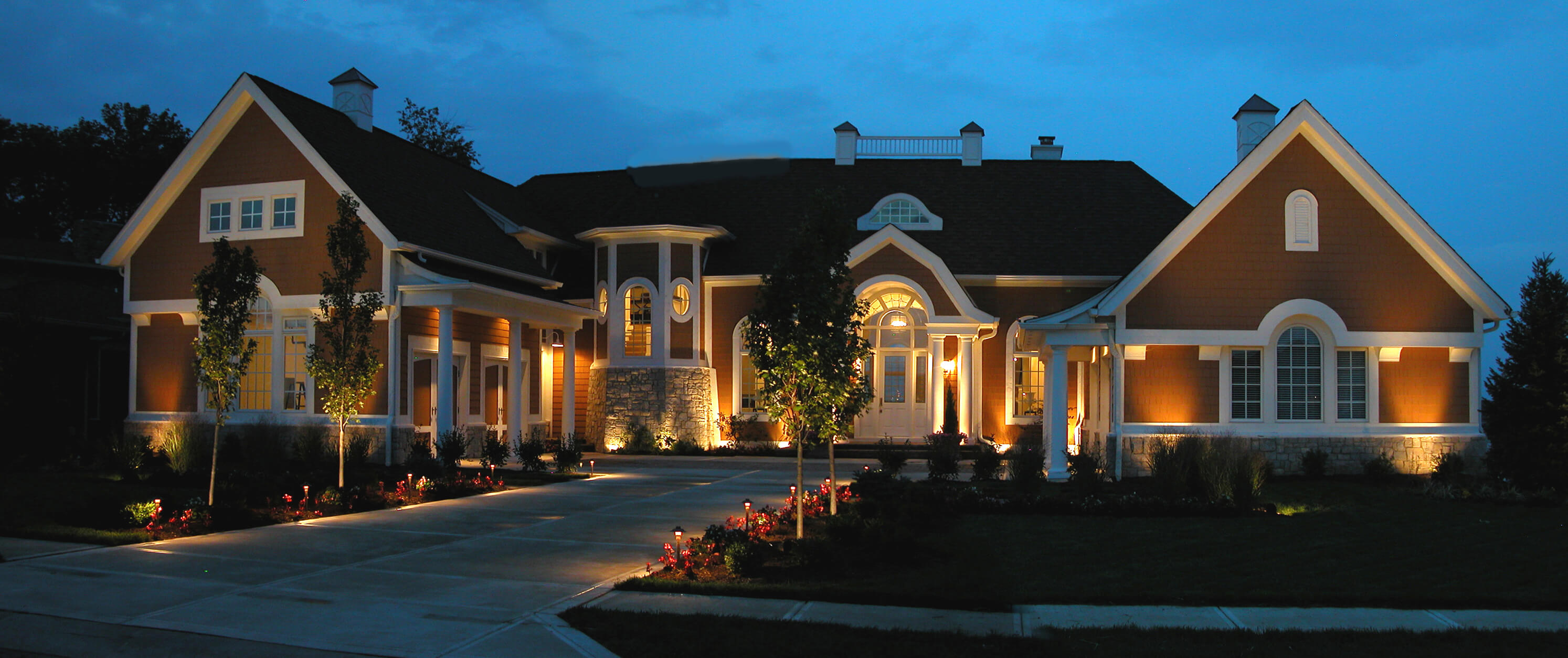 Well lit front of house and driveway 