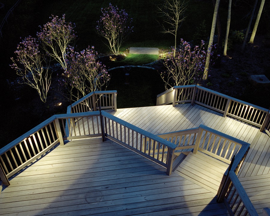 House with deck lighting