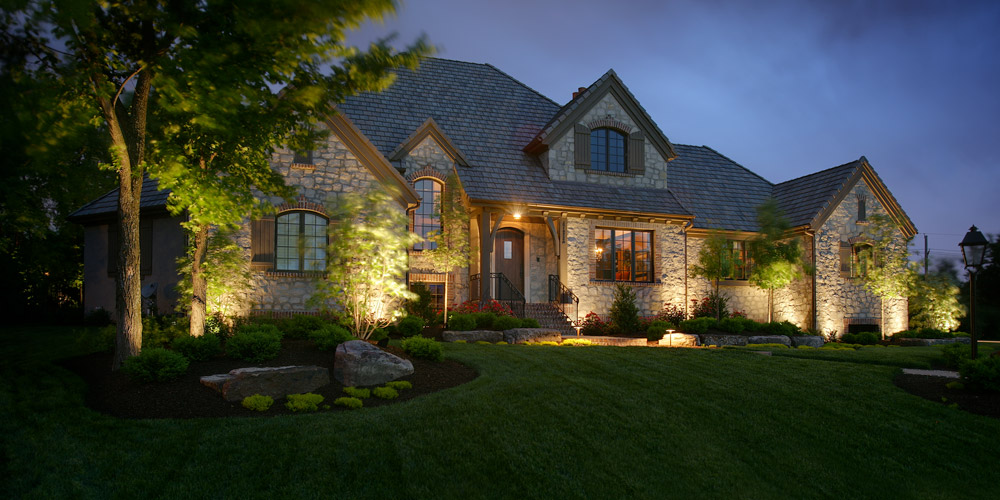 Cayce Home with outdoor lights installed