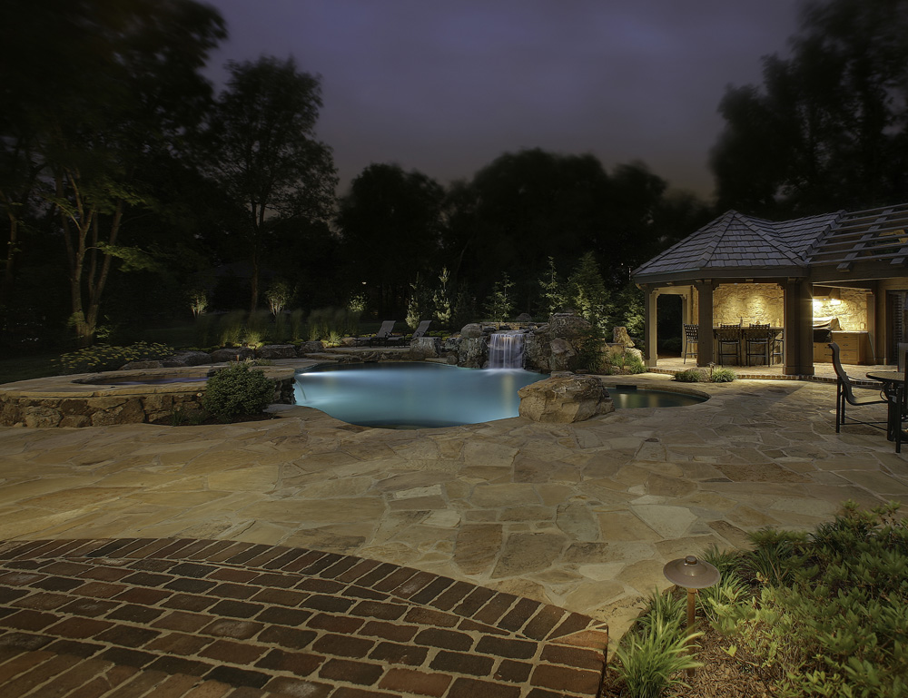 Backyard pool with lighting