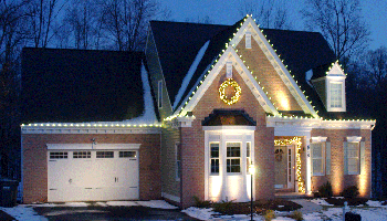 Home with roofline holiday lighting