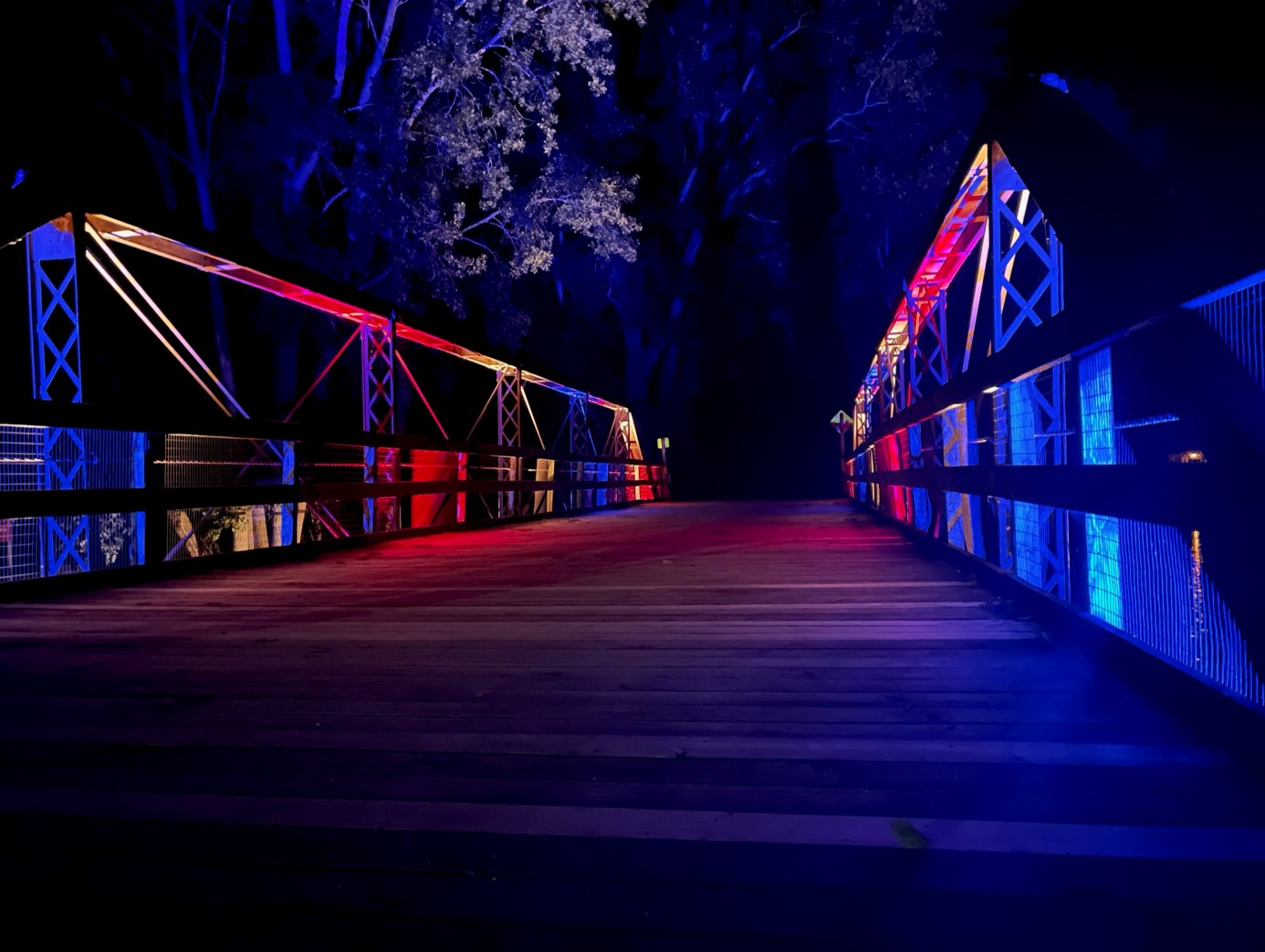 red white and blue lights on bridge 