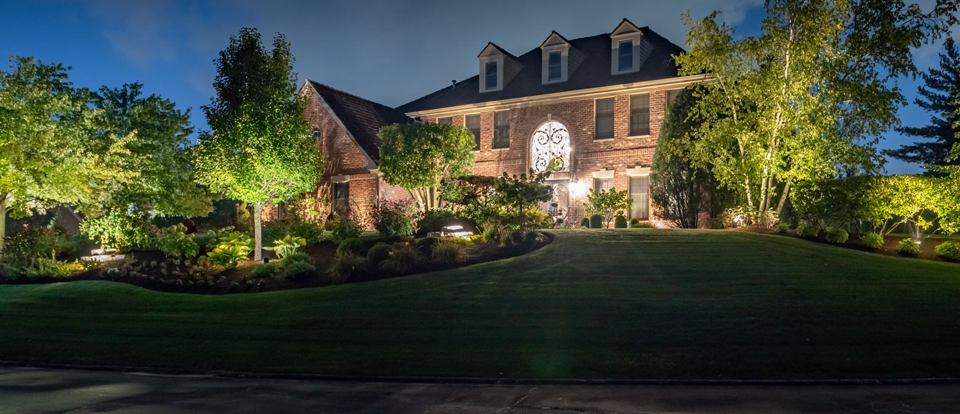 home with outdoor lighting
