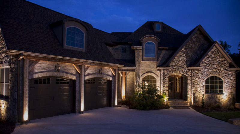 Home with outdoor lighting