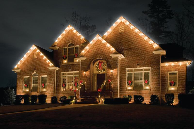 House with outdoor Christmas light and decoration