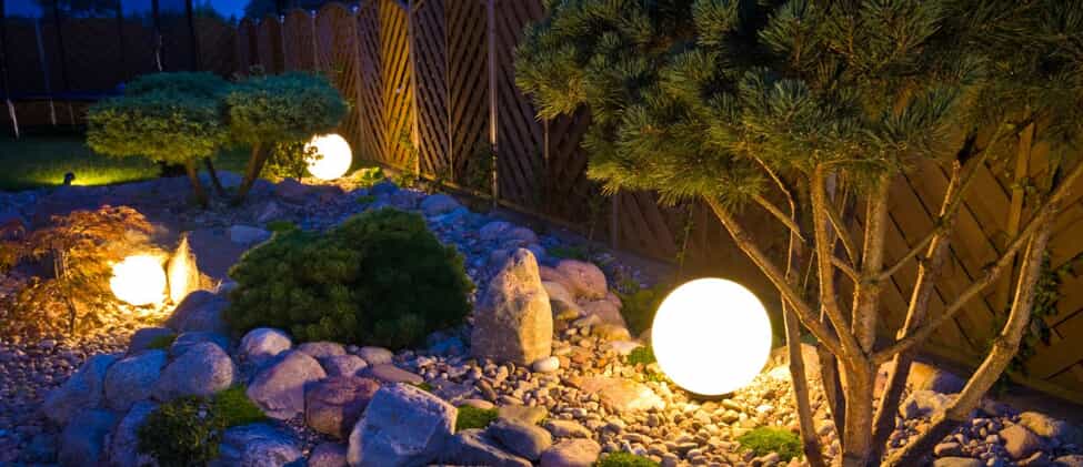rock garden with professional outdoor lighting
