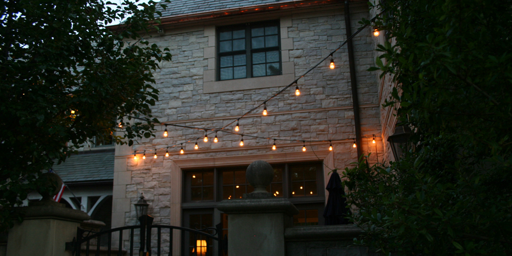 Outside area with festive string lighting