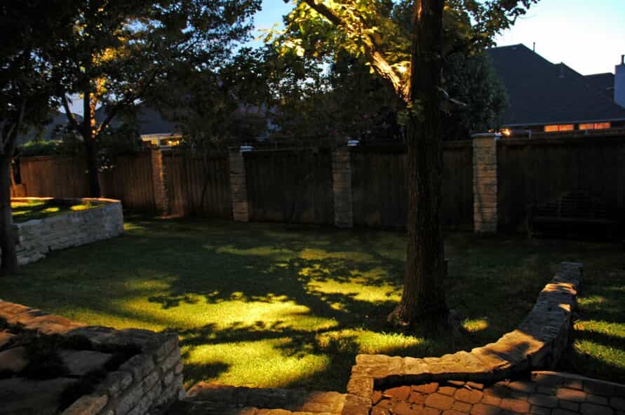 Residential yard with landscape lighting