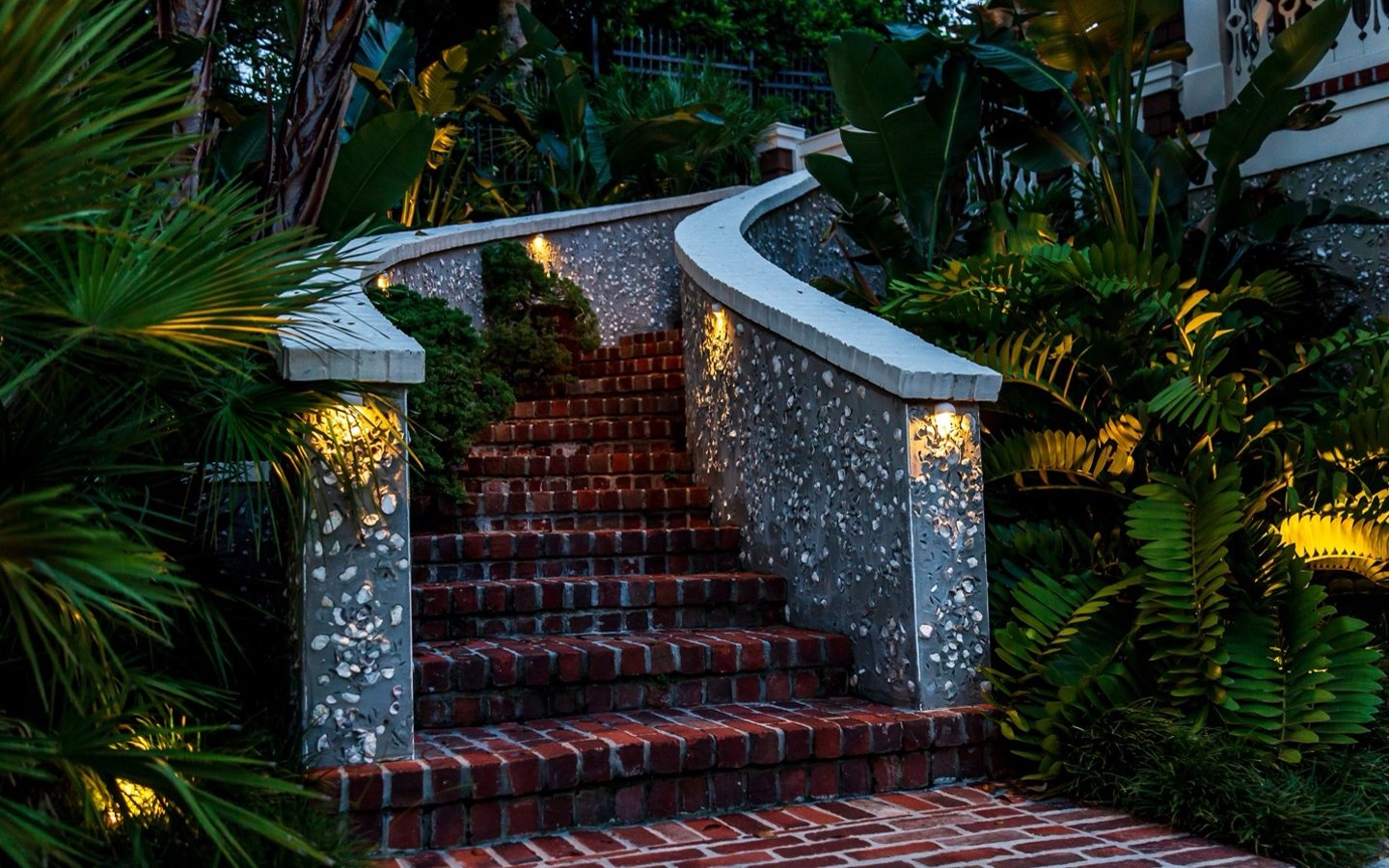 A staircase leading to a house
Description automatically generated