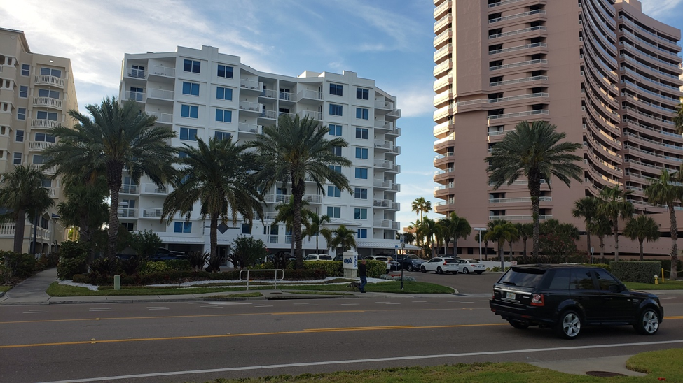 Condo buildings with palm trees