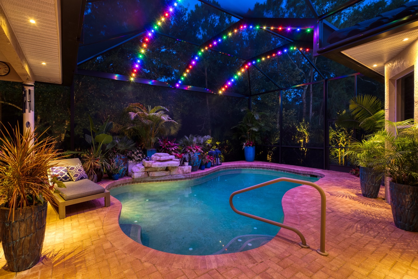 colored LED RGB Roofline Lighting used in pool lanai.