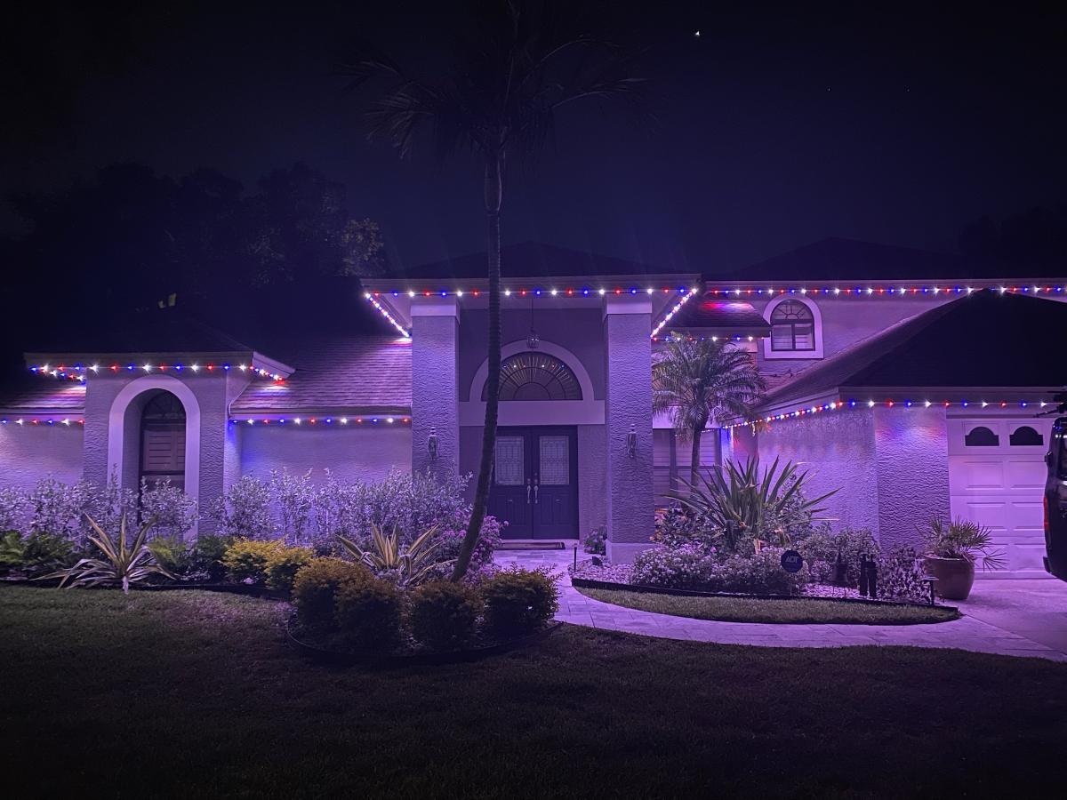 red, white, and blue led lights on a Florida home