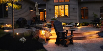 patio lighting with stairs and landscape enhancement