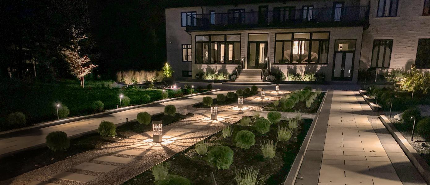 pavers with gravel minimal plants and outdoor lighting