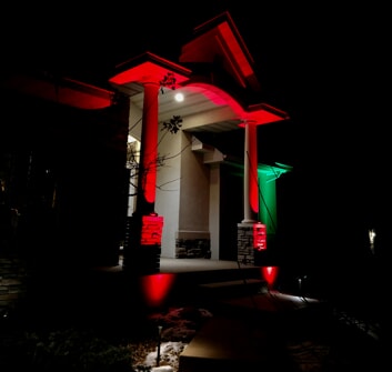 colorful outdoor lighting in front of house