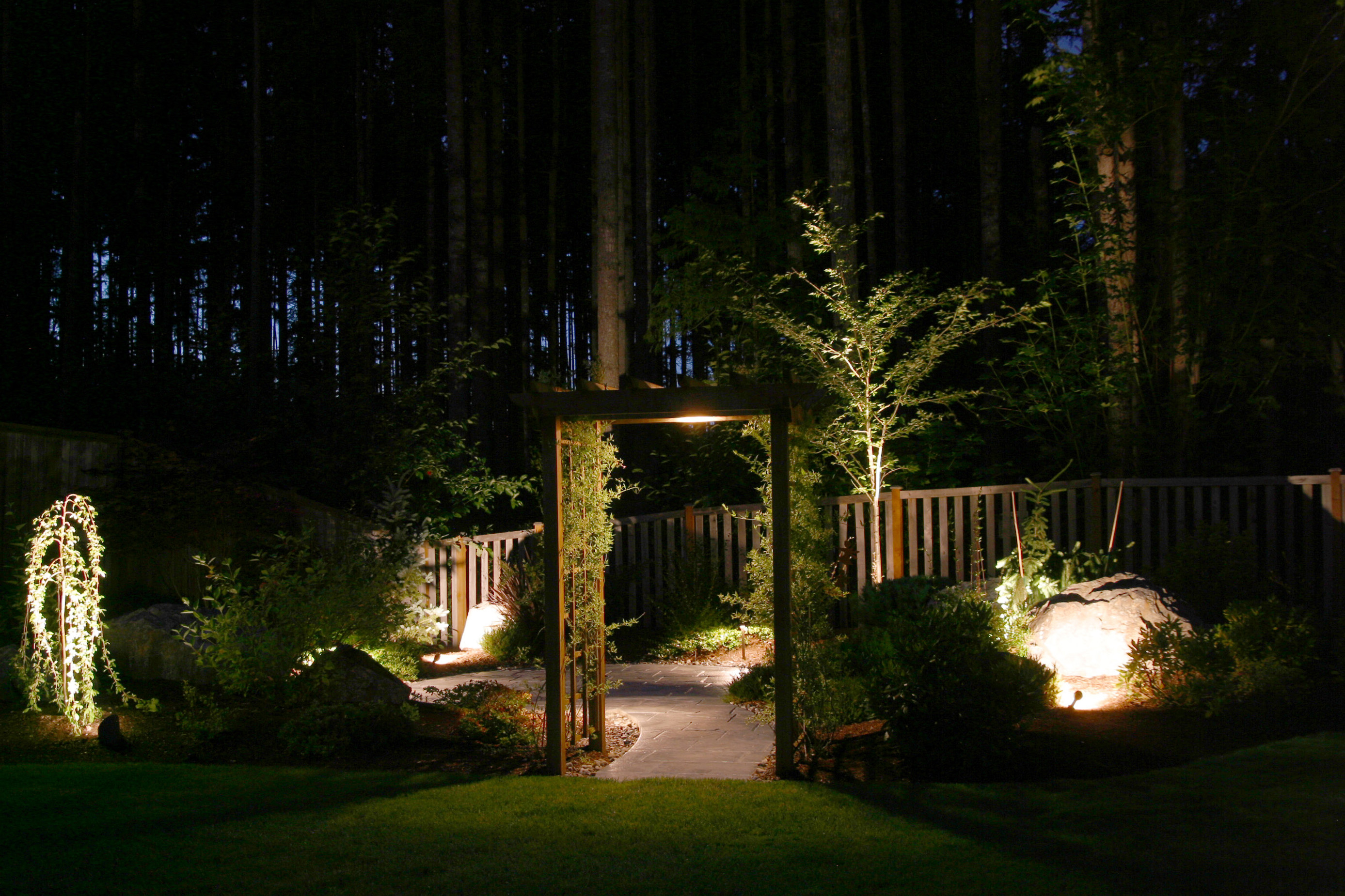 Residential yard with gazebo and lighting