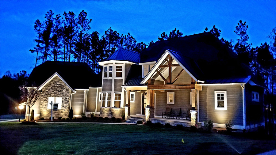 Exterior front of home with special lighting