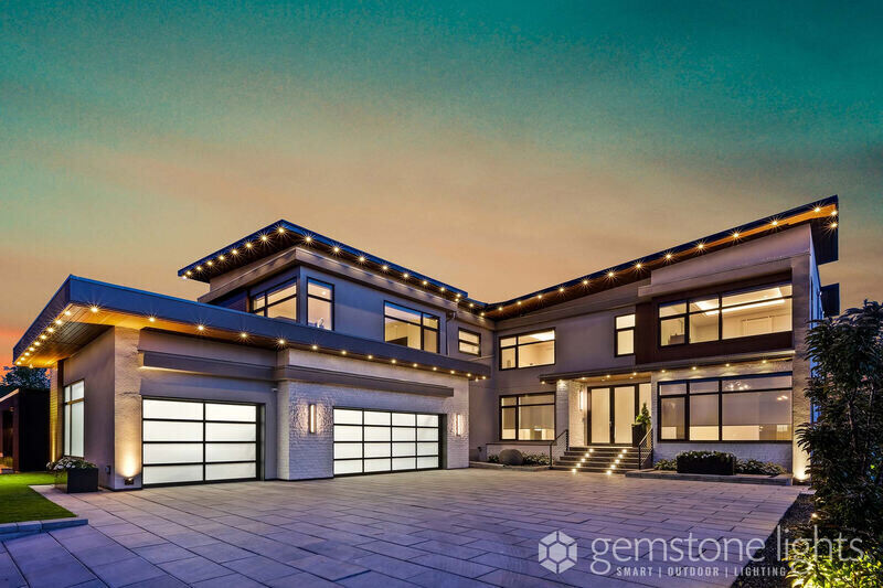 Gemstone Lights on a two story modern style home