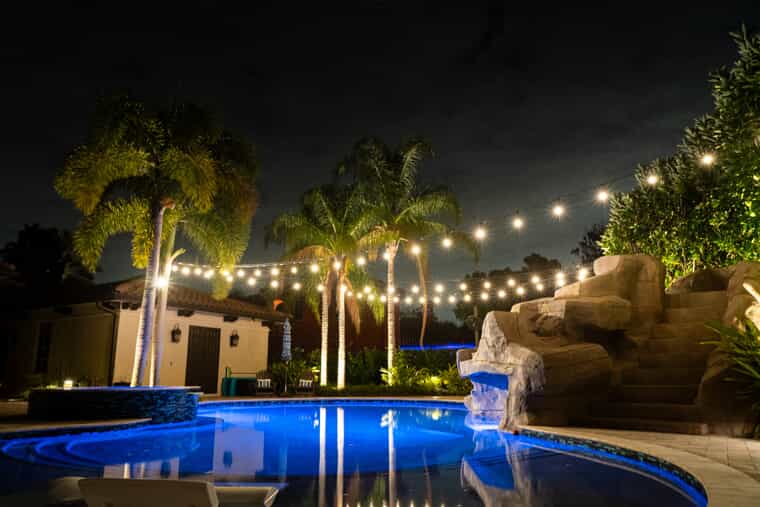 string lighting over pool