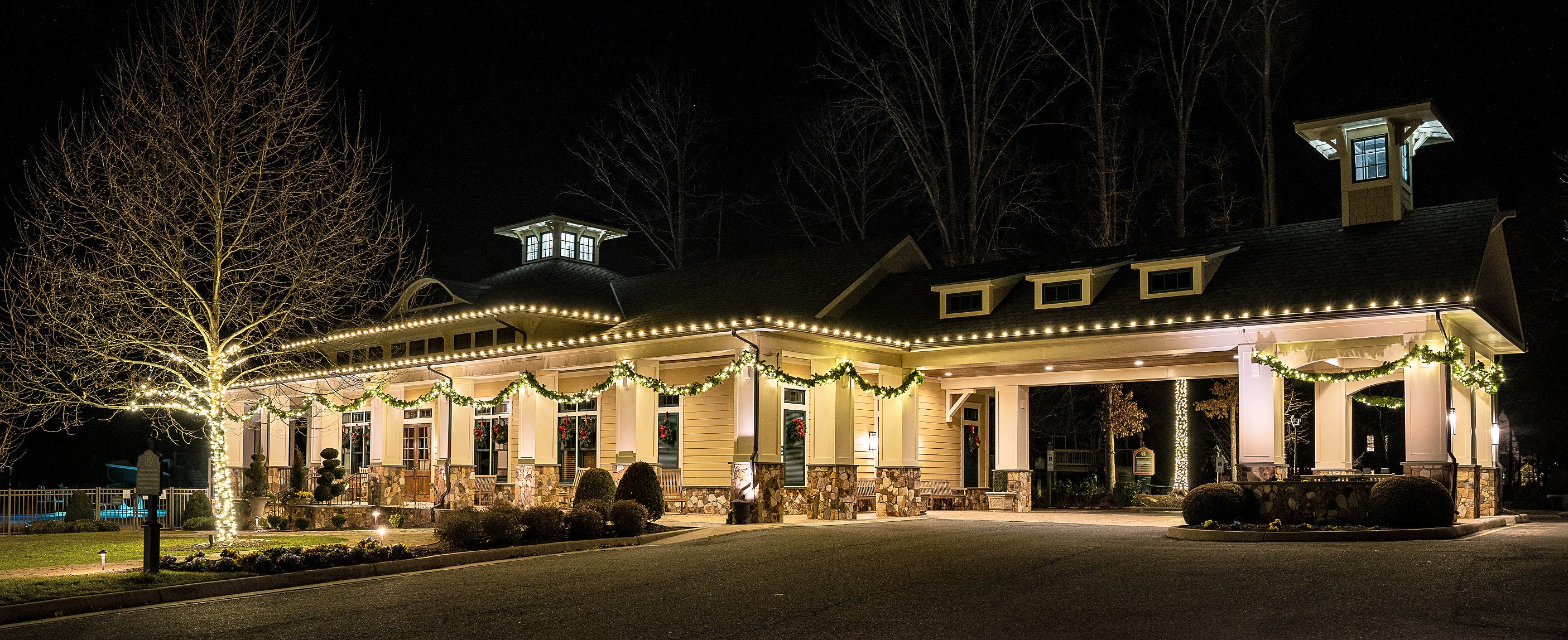 Commercial property decorated with professional Christmas lights