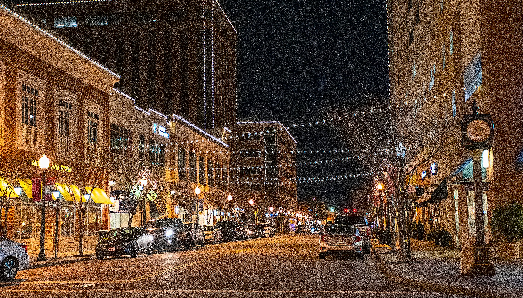 Christmas lighting decorating a commercial retail center